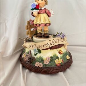 Goebel Hummel a wish for Mother . Plays I Just called to say I Love you